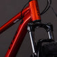 CUBE Aim ONE 2026 sundowner & black vista frontal con horquilla de suspensión
