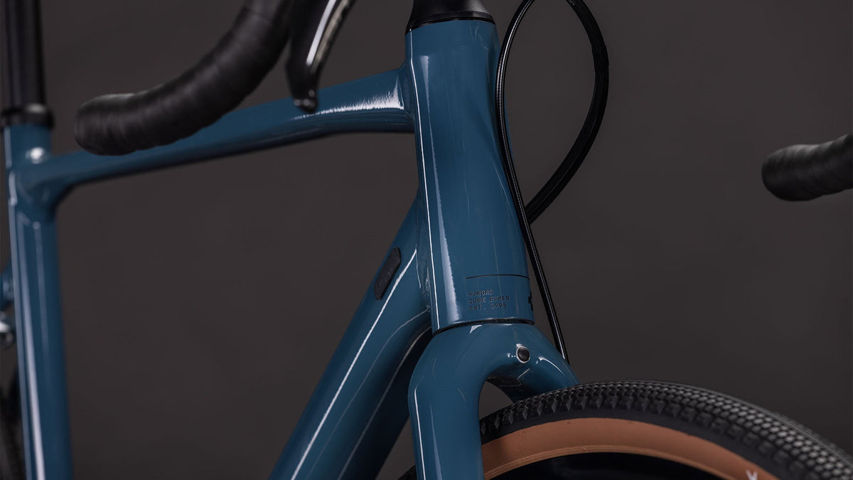 CUBE Nuroad ONE 2026 detalle cuadro aluminio grovegreen acabado premium